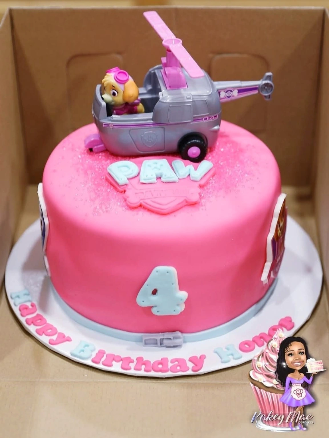 Pink character birthday cake by Kakey Mae